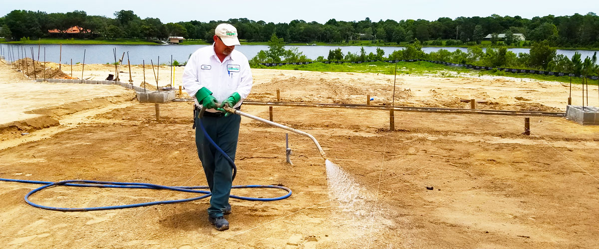 Pro-Tek Pest Control Expert Pre-Trreating Soil at Construction Site